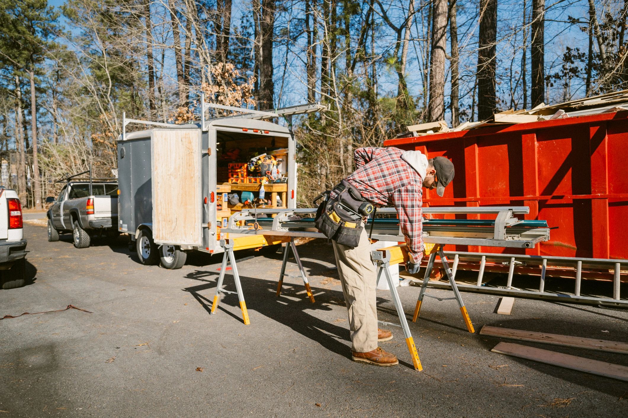 Technician preparing industrial metalworking equipment for service